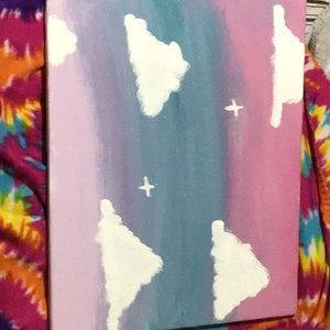 A painting with clouds